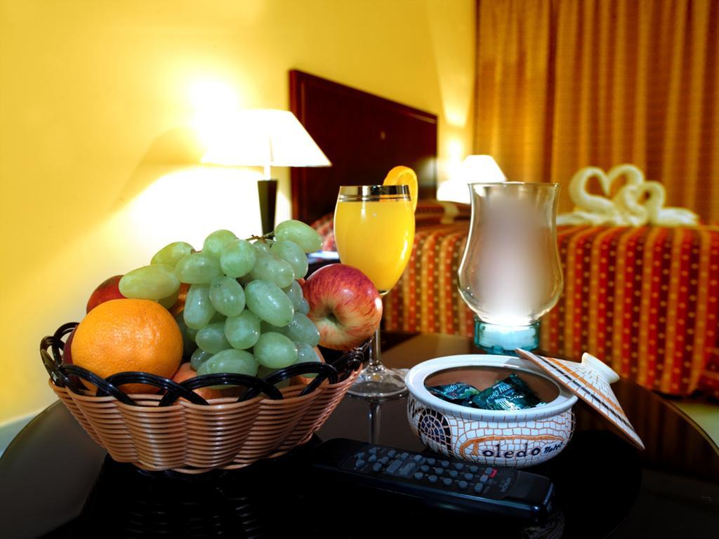 فندق فندق توليدو عمان الغرفة الصورة